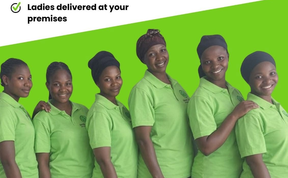 Maid2Clean cleaning team in green uniforms